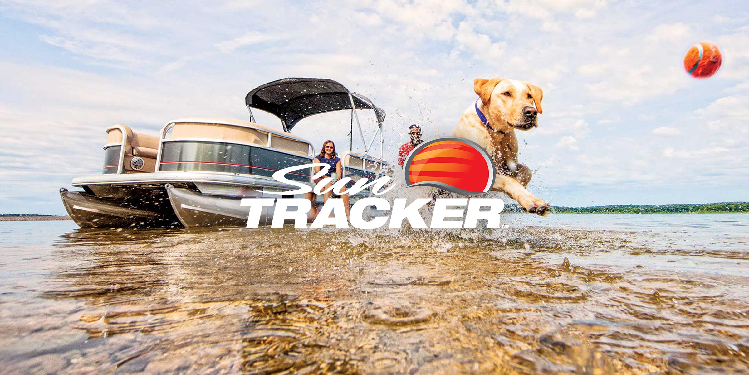 Sun Tracker logo on dog chasing ball image